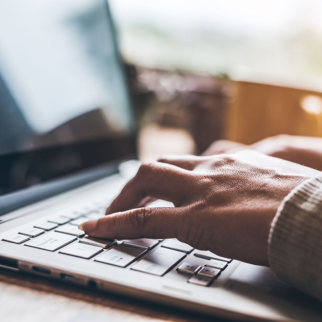 Man doing research on a laptop